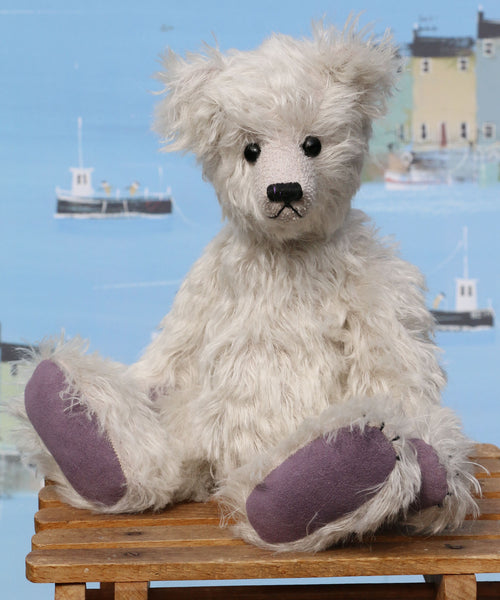 Fairbrother is a sweet and gentle, one of a kind, traditional artist teddy bear made from beautiful German mohair, by Barbara-Ann Bears Fairbrother stands 12 inches (30cm) tall and is 9 inches (23cm) sitting Fairbrother is made from beautiful, slightly wavy, silver German mohair which has a hint of lilac in the backing