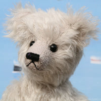 Fairbrother is a sweet and gentle, one of a kind, traditional artist teddy bear made from beautiful German mohair, by Barbara-Ann Bears Fairbrother stands 12 inches (30cm) tall and is 9 inches (23cm) sitting Fairbrother is made from beautiful, slightly wavy, silver German mohair which has a hint of lilac in the backing