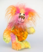 Wowzer is an extremely cheerful multi-coloured bear, a bear of beautiful, vivid, spicy colours