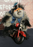 Fast Freddie Fuzzface is a wild, freakishly fast and surprisingly friendly, one of a kind, mohair, artist,  biker bear by Barbara-Ann Bears Fast Freddie Fuzzface is 11.5 inches (29 cm) tall sitting on his bike, sitting without a bike he is 10 inches (25 cm) tall and his bike is 14.5 inches (36 cm) long. Fast Freddie Fuzzface is a wild and unruly chap, a biker who loves nothing more than to spend days out on the open road