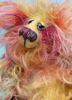 Felix Frizzle-Frazzle is a wild and scruffy bear in a mixture of beautiful natural colours, he is quite a little bear, he stands just 6.5 inches( 17 cm) tall and is 5 inches ( 13 cm) sitting. Felix is mostly made from a very long, frizzy and wildly fluffy mohair hand dyed in many natural shades