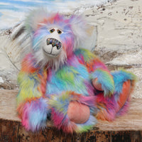 Festive Freda is a wonderfully colourful and cuddly, one of a kind, artist teddy bear in gorgeous faux fur and mohair by Barbara-Ann Bears, she's 19 inches (47 cm) tall and is 14.5 inches (37 cm) sitting.  Festive Freda is made from a long, soft, dense faux fur in turquoise, pale blue, yellow, orange magenta and lilac