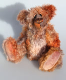 Fletcher McTrossach is a wild highland mountain bear, a one of a kind artist bear in beautiful hand dyed mohair by Barbara-Ann Bears Fletcher McTrossach stands 12 inches(30 cm) tall and is 9 inches (23 cm) sitting. Fletcher McTrossach is a wild and shaggy chap, a bear who loves to climb wild desolate mountains, to be alone in the fiercest of gales, to feel the wind tugging at his glorious fur.