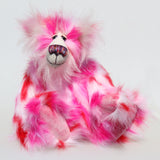 Francisco is a gloriously pink, fun-loving and comical, one of a kind artist bear by Barbara-Ann Bears in luxurious mohair and rather wild faux fur, he stands 14.5 inches/37 cm tall. Francisco is made from long, fluffy faux fur with patches of magenta, baby pink, scarlet and white, coupled with a long white mohair.