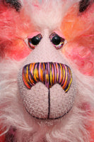 Fraser Glowbug-Grinchaser is a beautifully coloured and elegant, one of a kind artist teddy bear, in hand dyed mohair by Barbara-Ann Bears. Fraser Glowbug-Grinchaser stands 16.5 inches( 29 cm) tall and is 12.5 inches (20 cm) sitting. 