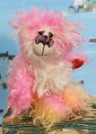Fluffy Freda is a wonderfully fluffy and beautifully coloured, one of a kind artist bear, in hand dyed mohair by Barbara-Ann Bears Fluffy Freda stands 9 inches( 23 cm) tall and is 7 inches (18 cm) sitting. Fluffy Freda is a sweet and gentle teddy bear, she is full of smiles and happiness and also wonderfully fluffy.