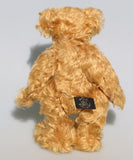 Funky Frankie is a wild and groovy guy, a veteran mohair artist bear from Barbara-Ann Bears, he stands 11 inches (28cm) tall and is 8 inches (20cm) sitting.  Funky Frankie was made in the late 1990s from beautiful English mohair, it's a rich, antique gold, gently distressed mohair and he has brown suedette paw pads