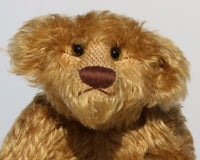 Funky Frankie is a wild and groovy guy, a veteran mohair artist bear from Barbara-Ann Bears, he has amber glass eyes that match his mohair perfectly and a pert, chestnut coloured, meticulously embroidered nose. 