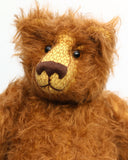 Garth is a very sweet and cuddly, artist teddy bear by Barbara Ann Bears in wonderful chocolate brown mohair, he stands 11 inches/28 cm tall and is 8.5 inches/21 cm sitting. Garth is made from a beautiful, slightly distressed brown German mohair with matching German wool-felt paw pads and small amber glass eyes