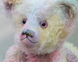 Gertrude has glass eyes which were painted to match her mohair, a beautiful nose carefully embroidered with individual threads to also match her colouring and a content and gracious expression.