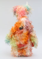 Goose, a sweet bear of gentle hilarity, a one of a kind, artist bear by Barbara-Ann Bears in delicately colourful, shaggy hand dyed mohair, he stands 16 inches (39 cm) tall and is 12 inches (30 cm) sitting and is made from a long shaggy distressed mohair that Barbara has hand dyed in a gorgeous blend of pastel colours.