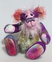Harry Huckleberry is a colourful and exotic, one of a kind, artist bear by Barbara-Ann Bears in luxurious mohair and upcycled Peruvian wool fabric. He stands 15 inches (38 cm) tall and is 12 inches (30 cm) sitting.  Harry Huckleberry is a wonderful, colourful teddy bear although, he was once a little Peruvian jacket 