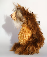 Harvey Nutbundler, an appealingly wild and friendly one of a kind artist teddy bear in stunning mohair by Barbara-Ann Bears Harvey Nutbundler stands 12.5 inches (31 cm) tall and is 9.5 inches (24 cm) sitting. Harvey Nutbundler is a sweet, handsome bear, a bear who can be seen wandering through open woodland collecting nuts and berries