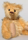 Honeynut is a cuddly little bear with a very sweet character. His mohair gives him a slightly scruffy, raggedy appearance like a small boy who loves to play out in the woods, climbing trees, crashing through brambles, making rope swings and generally having a whale of a time. Although a traditional teddy bear, he's more fun than most.