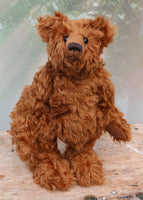 Horatio is an elegant and charming, one of a kind, traditional artist teddy bear by Barbara Ann Bears in wonderful cinnamon coloured English mohair. He stands 14 inches/36cm tall and is 10.5 inches/26 cm sitting, he is like very earliest teddy bears, with longer arms, a long snout and quite bear-like, yet still cuddly