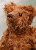 Horatio is an elegant and charming, one of a kind, traditional artist teddy bear by Barbara Ann Bears in wonderful cinnamon coloured English mohair. He stands 14 inches/36cm tall and is 10.5 inches/26 cm sitting, he is like very earliest teddy bears, with longer arms, a long snout and quite bear-like, yet still cuddly