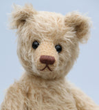 Horton is a sweet and gentle, one of a kind, traditional artist teddy bear made from beautiful German mohair, by Barbara-Ann Bears. Horton stands 11 inches (28cm) tall and is 8.5 inches (22cm) sitting. Horton is a sweet and charming traditional bear, with his beautiful blond mohair and his boot button eyes