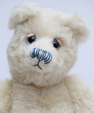 Izzy is one of our old bears, he's a sweet and chirpy, traditional teddy bear made from gorgeous English mohair by Barbara Ann Bears. Izzy stands 10.5 inches (26cm) tall and is 8 inches (20cm) sitting.