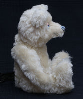 Izzy is one of our old bears, he's a sweet and chirpy, traditional teddy bear made from gorgeous English mohair by Barbara Ann Bears. Izzy stands 10.5 inches (26cm) tall and is 8 inches (20cm) sitting.