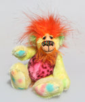 Jeremiah Jitterbug is a joyous celebration of colourful happiness, a one of a kind, hand dyed mohair and faux fur artist bear by Barbara-Ann Bears, he stands 6.5 inches/ 16 cm tall and is 5 inches/ 13 cm sitting. He's a very colourful bear in yellow, pink and orange who loves to see you smile