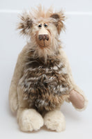 Jerome is a big, stunning, wild and wonderful, one of a kind, artist teddy bear in gorgeous faux fur and mohair by Barbara-Ann Bears he stands 19 inches (48 cm) tall and is 14.5 inches (37 cm) sitting. 