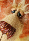 Jerome is a charming and elegant, yet whimsical, one of a kind, artist teddy bear by Barbara-Ann Bears in wonderful curly tipped mohair Jerome stands 17 inches(43 cm) tall and is 13 inches(33 cm) sitting. Jerome is a very handsome bear, with his dashing good looks, that sparkle in his eye and his wistful smile