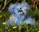 Joachim is a warm and handsome, one of a kind, artist bear by Barbara-Ann Bears in wonderful fluffy hand-dyed mohair like a blue summer sky. Joachim stands 11.5 inches (29 cm) tall and is 9 inches (23 cm) sitting. 