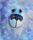 Joachim is a warm and handsome, one of a kind, artist bear by Barbara-Ann Bears in wonderful fluffy hand-dyed mohair like a blue summer sky. Joachim stands 11.5 inches (29 cm) tall and is 9 inches (23 cm) sitting. 