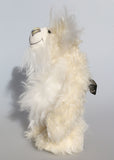 Johann is a very handsome and cuddly, one of a kind, artist snow bear by Barbara-Ann Bears in wonderfully fluffy mohair and Japanese silk Johann stands 9.5 inches(25 cm) tall and is 7.5 inches (16 cm) sitting.  Johann has the most gorgeous snowy fur he'll light up any room with his smile and wonderful personality.