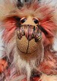 King Konk is an exotic, fun-loving and comical, one of a kind, artist bear by Barbara-Ann Bears in long mohair and rather wild faux fur. He stands 16 inches (40 cm) tall and is 12 inches (30 cm) sitting. King Konk is made from the most gorgeous and luxurious long faux fur, it looks like a patchwork but is one piece of fabric, areas of rose, cream, peach and pink are outlined in black