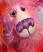 Kylie Calypso, a joyous celebration of colourful happiness, a one of a kind artist bear in hand dyed mohair & faux fur by Barbara-Ann Bears, Kylie Calypso stands 10 inches( 25 cm) tall and is 7.5 inches ( 19 cm) sitting. She's full of summertime sunshine that lasts all year long.