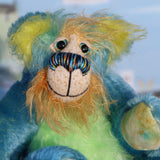 Larry Lagoon has large, beautiful, hand painted eyes with eyelids, a splendid nose embroidered from individual threads to match his colouring and he has a huge, friendly smile