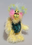 Leo Fuzzball is a joyous celebration of colourful happiness, a one of a kind, hand dyed mohair and faux fur artist bear by Barbara-Ann Bears, he stands 8.5 inches/21 cm tall and is 6.5 inches/16 cm sitting.  Leo Fuzzball, a bear full of sunshine and happiness with the warm colours of summer to carry you through winter