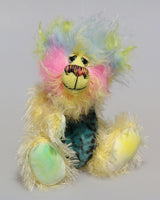 Leo Fuzzball is a joyous celebration of colourful happiness, a one of a kind, hand dyed mohair and faux fur artist bear by Barbara-Ann Bears, he stands 8.5 inches/21 cm tall and is 6.5 inches/16 cm sitting. Leo Fuzzball, a bear full of sunshine and happiness with the warm colours of summer to carry you through winter