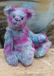 Lettie, a sweet and romantic, one of a kind, traditional, artist teddy bear in gorgeous pink and blue hand-dyed mohair by Barbara Ann Bears Lettie stands 11 inches (28cm) tall and is 8.5 inches (22cm) sitting, she is made from a slightly wavy fairly sparse mohair, that Barbara has dyed in bands of sky blue and magenta