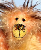 Lionheart is a wild and colourful one of a kind, hand dyed mohair artist bear by Barbara-Ann Bears, he stands 11 inches( 28 cm) tall and is 8 inches (20 cm) sitting. Lionheart is mostly made from a long, twirly, tousled mohair that Barbara has hand dyed in pastel shades of yellow, peach, orange and pink