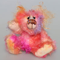 Little Schubert is an adorably colourful and sweet, one of a kind artist bear in scrumptious hand-dyed mohair by Barbara-Ann Bears. Little Schubert stands just 6.5 inches (16 cm) tall and is 5 inches (12 cm) sitting.