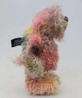 Lonnie Puckleton is an endearingly sweet and gentle, beautifully coloured, one of a kind hand dyed mohair artist bear by Barbara-Ann Bears, he stands 10 inches/25 cm tall and is 7.5 inches/18 cm sitting.  Lonnie's mohair is hand dyed with splashes of emerald, dusky rose, slate grey, peach, deep purple, blonde and lilac