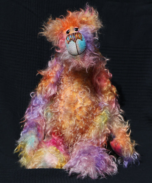 Lucian Limbos, the most gloriously coloured and flamboyant yet laid back, one of a kind, hand dyed mohair, artist bear by Barbara-Ann Bears. Lucian Limbos stands 15.5 inches( 39 cm) tall and is 12.5 inches ( 32 cm) sitting