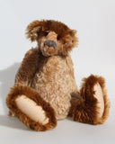 Ludwyn Gumboots is an elderly wanderer, a veteran mohair artist bear from Barbara-Ann Bears, he stands 16.5 inches (42cm) tall and is 11.5 inches (29cm) sitting.  Ludwyn Gumboots is a bear of the 1990s, a bear from our transition from the traditional into the wild and wonderful world of Barbara-Ann Bears