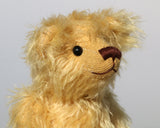 Marigold's Teddy is a lovely bear, he has the sweetest, most loving expression, he seems to be imploring you to pick him up and give him a hug
