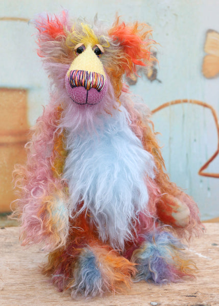 Marvin is a gorgeous, relaxed and gloriously colourful one of a kind artist bear in stunning hand dyed mohair by Barbara-Ann Bears, he stands 14 inches(36 cm) tall and is 11 inches (28 cm) sitting. Marvin is mostly made from a long, wildly distressed mohair that Barbara has dyed in a gorgeous blend of cheeerful colours