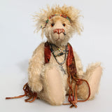 Marylou, a happy and very lovable hippy bear, a one of a kind, mohair, artist bear by Barbara-Ann Bears, she stands 13.5 inches(34 cm) tall and is 9.5 inches ( 24 cm) sitting. Marylou is made in medium length pale beige mohair, the top of her head and the backs of her ears are a longer, twirly strawberry-blond mohair