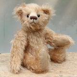 Matthew is a charming and traditional mohair artist bear by Barbara Ann Bears of the same design as the teddy bear we made for Downton Abbey.  He stands 10.5 inches/27 cm tall and is 8.5 inches/22 cm sitting and is made from  beautiful, wavy, fairly long beige coloured German mohair