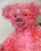 Maude is made from a wonderful, long and fluffy mohair which Barbara has dyed in many pretty shades of pink. Maude has subtly hand-dyed pink velvet felt paw pads and gorgeous hand painted glass eyes, she has a splendid, carefully embroidered nose and a relaxed and demure expression. 