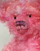 Maude is made from a wonderful, long and fluffy mohair which Barbara has dyed in many pretty shades of pink. Maude has subtly hand-dyed pink velvet felt paw pads and gorgeous hand painted glass eyes, she has a splendid, carefully embroidered nose and a relaxed and demure expression. 