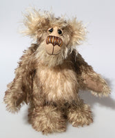Mossy Mostyn is a charming and very friendly, one of a kind, artist bear by Barbara-Ann Bears in wonderful tipped mohair and faux fur. Mossy Mostyn stands 11 inches(28 cm) tall and is 8.5 inches (21 cm) sitting.