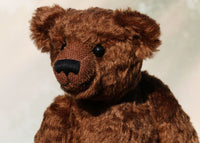 McPherson is a sweet and handsome, traditional teddy bear made from wonderful soft chocolate brown German mohair by Barbara Ann Bears. He is 16 inches (41cm) tall and is 11 inches (28cm) sitting. McPherson is made from a gorgeous, dense and soft, very slight distressed, delicious, warm chocolatey brown German mohair