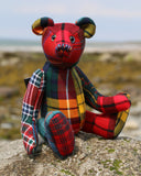 McTavish is a an elegant and refined traditional Barbara Ann Bear made in a blend of fine Scottish tartans  McTavish is 12 inches (31cm) tall and is 9 inches (23cm) sitting.  McTavish is our first Scottish tartan bear, a calm and elegant fellow in a striking mixture of pattern and colour