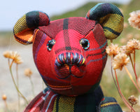 McTavish has hand painted eyes and an intricately embroidered nose to match his colouring and he has a sweet, loving expression